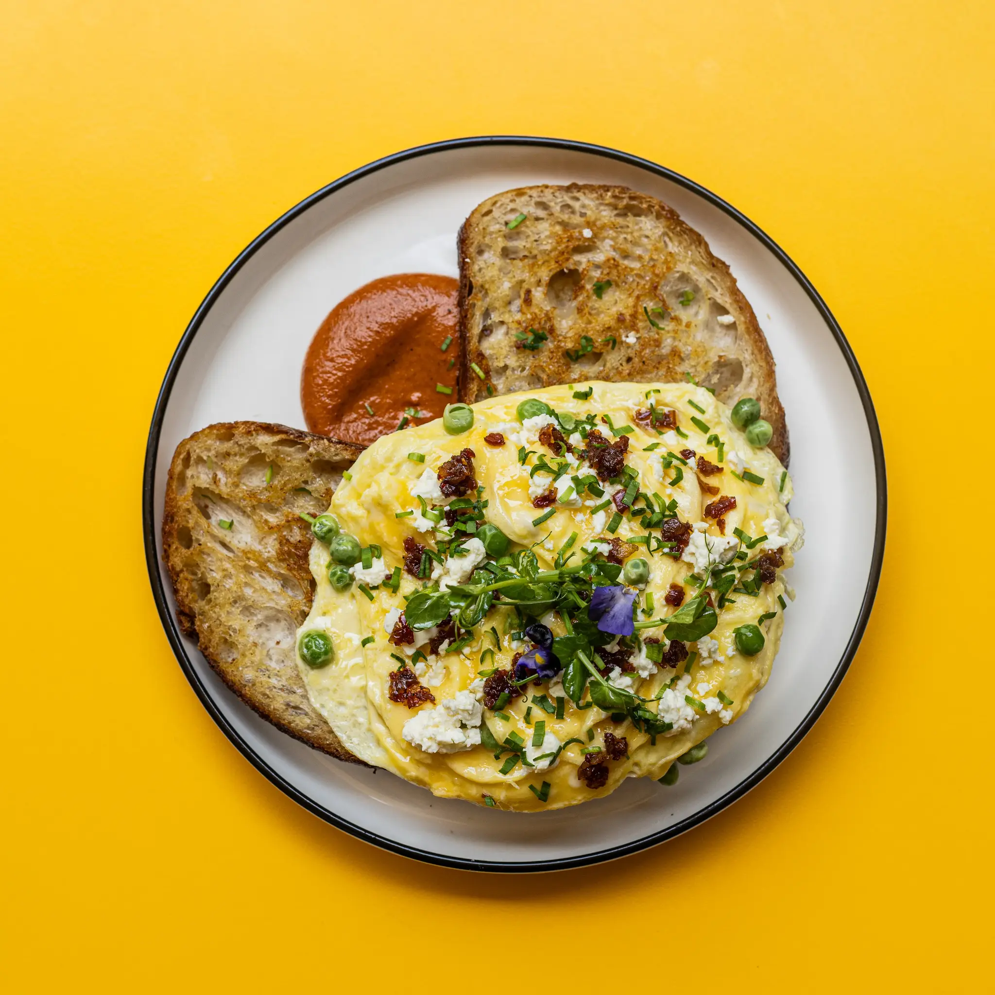 Scrambled Eggs with Smoked Bacon Jam and Feta